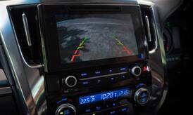 A close up of the central Display of automotive dashboard.