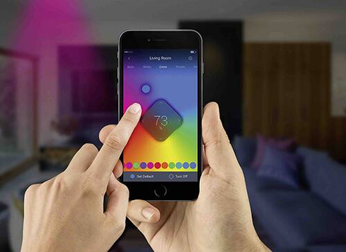 The smartphone is a popular interface for controlling smart lighting. (Courtesy of ilumi.)
